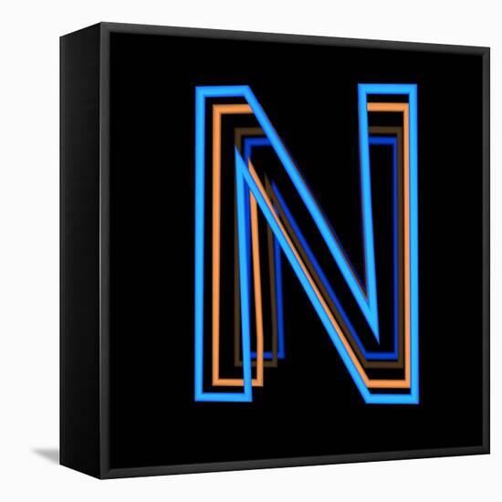 Glowing Letter N Isolated On Black Background-Andriy Zholudyev-Framed Stretched Canvas