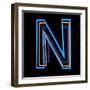 Glowing Letter N Isolated On Black Background-Andriy Zholudyev-Framed Art Print