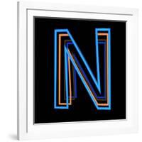 Glowing Letter N Isolated On Black Background-Andriy Zholudyev-Framed Art Print