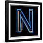 Glowing Letter N Isolated On Black Background-Andriy Zholudyev-Framed Art Print