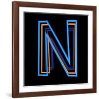 Glowing Letter N Isolated On Black Background-Andriy Zholudyev-Framed Art Print