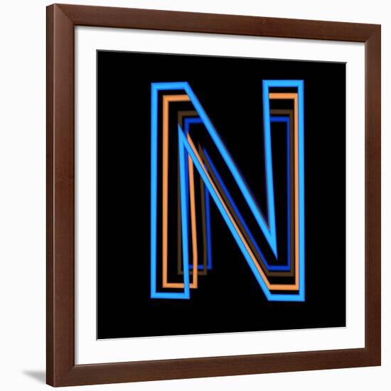 Glowing Letter N Isolated On Black Background-Andriy Zholudyev-Framed Art Print