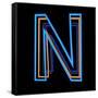 Glowing Letter N Isolated On Black Background-Andriy Zholudyev-Framed Stretched Canvas