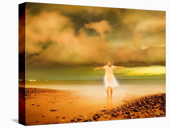 Glowing Woman Standing on the Beach-Jan Lakey-Stretched Canvas