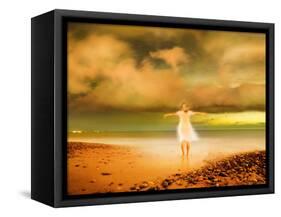 Glowing Woman Standing on the Beach-Jan Lakey-Framed Stretched Canvas