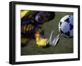 Goalie Attempting to Stop a Soccer Ball-null-Framed Photographic Print