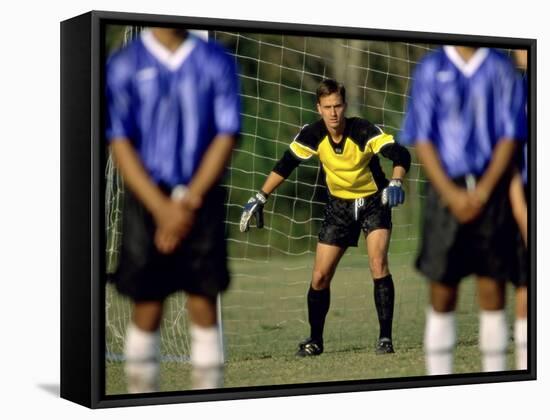 Goalie Preparing to Block Penalty Shot-null-Framed Stretched Canvas