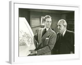 Going over Design Plan-null-Framed Photo