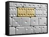 Gold domino amid silver dominoes-null-Framed Stretched Canvas