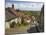 Gold Hill, cobbled lane lined with cottages and views over countryside, Shaftesbury, Dorset-Stuart Black-Mounted Premium Photographic Print