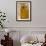 Gold Ribbon Trailing over Cherub Figure in Corner of Room-Richard Bryant-Framed Photo displayed on a wall