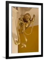 Gold Ribbon Trailing over Cherub Figure in Corner of Room-Richard Bryant-Framed Photo