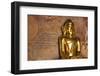 Golden Buddha Statue in Front of Burmese Writing on Wall, Bagan, Myanmar-Harry Marx-Framed Photographic Print
