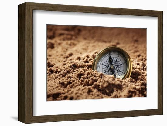 Golden Compass Buried in the Sand Concept for Lost or Direction-Flynt-Framed Photographic Print