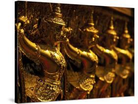 Golden Figures, Thailand-Walter Bibikow-Stretched Canvas