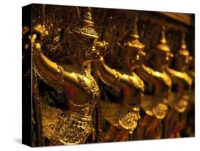 Golden Figures, Thailand-Walter Bibikow-Stretched Canvas