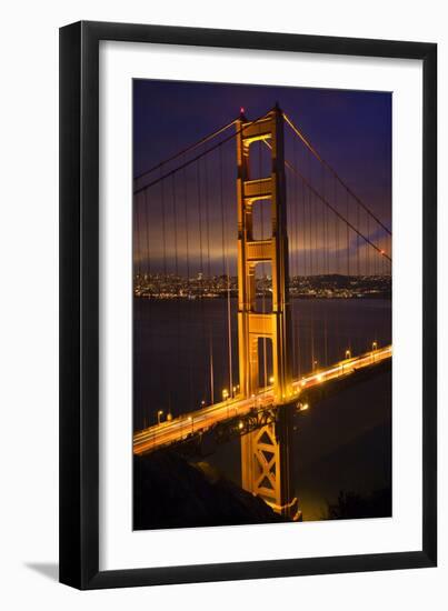 Golden Gate Bridge, Night Vertical with Lights of San Francisco, California in Background-William Perry-Framed Photographic Print