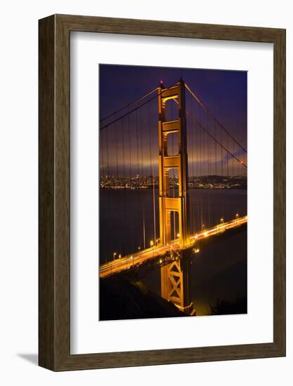 Golden Gate Bridge, Night Vertical with Lights of San Francisco, California in Background-William Perry-Framed Photographic Print