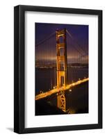 Golden Gate Bridge, Night Vertical with Lights of San Francisco, California in Background-William Perry-Framed Photographic Print