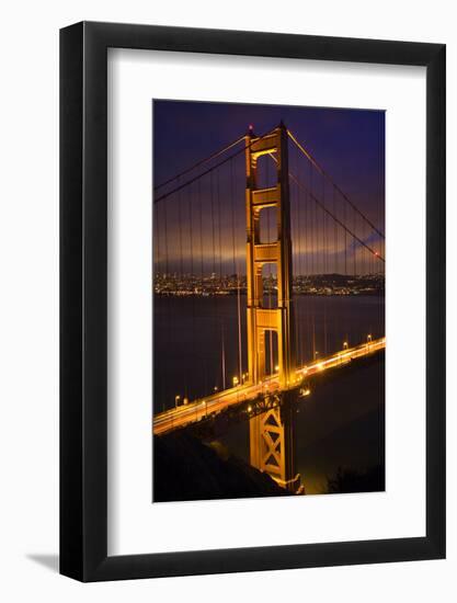 Golden Gate Bridge, Night Vertical with Lights of San Francisco, California in Background-William Perry-Framed Photographic Print