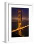 Golden Gate Bridge, Night Vertical with Lights of San Francisco, California in Background-William Perry-Framed Photographic Print