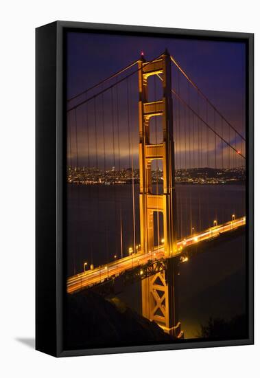 Golden Gate Bridge, Night Vertical with Lights of San Francisco, California in Background-William Perry-Framed Stretched Canvas
