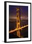 Golden Gate Bridge, Night Vertical with Lights of San Francisco, California in Background-William Perry-Framed Photographic Print