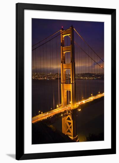 Golden Gate Bridge, Night Vertical with Lights of San Francisco, California in Background-William Perry-Framed Photographic Print