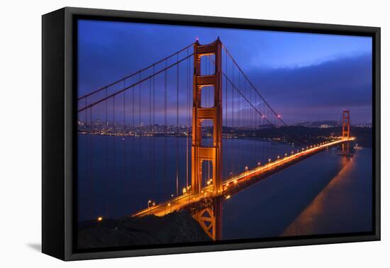 Golden Gate Bridge Sunset Pink Skies Evening with Lights of San Francisco, California in Background-William Perry-Framed Stretched Canvas