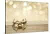 Golden Ribbon Bow with Bokeh, Christmas Decoration-Liang Zhang-Stretched Canvas