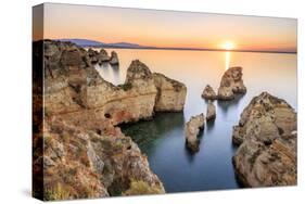 Golden sunrise on the  red cliffs of Ponta da Piedade Lagos Algarve Portugal Europe-ClickAlps-Stretched Canvas