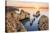 Golden sunrise on the  red cliffs of Ponta da Piedade Lagos Algarve Portugal Europe-ClickAlps-Stretched Canvas