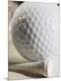 Golf Ball and Golf Tee-Tom Grill-Mounted Photographic Print