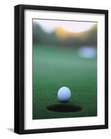 Golf Ball Close to Hole-Robert Llewellyn-Framed Photographic Print