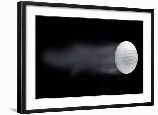 Golf Ball Leaving Trails Behind On Black Background-null-Framed Art Print