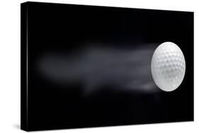 Golf Ball Leaving Trails Behind On Black Background-null-Stretched Canvas