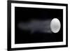 Golf Ball Leaving Trails Behind On Black Background-null-Framed Art Print