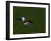 Golf Ball Sitting Near the Hole-null-Framed Photographic Print