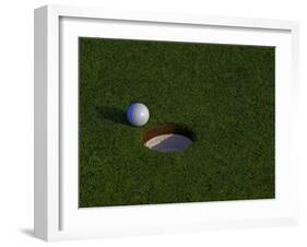 Golf Ball Sitting Near the Hole-null-Framed Photographic Print