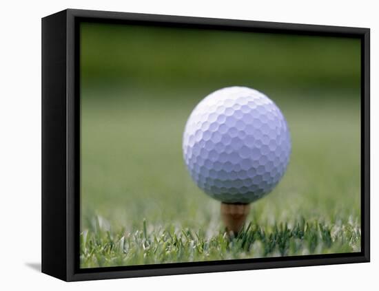 Golf Ball Sitting Oin a Tee-null-Framed Stretched Canvas