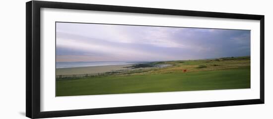 Golf Flag on a Golf Course, Royal Porthcawl Golf Club, Porthcawl, Wales-null-Framed Photographic Print