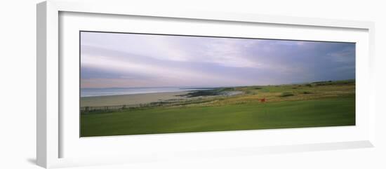 Golf Flag on a Golf Course, Royal Porthcawl Golf Club, Porthcawl, Wales-null-Framed Photographic Print