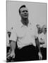 Golf Pro Arnold Palmer Putting Hand on Clubs Between Shots During Tournament-null-Mounted Premium Photographic Print