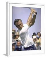 Golfer Arnold Palmer Swinging Club as Spectators Look on at Event-John Dominis-Framed Premium Photographic Print