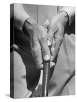 Golfer Ben Hogan Demonstrating Reverse Overlapping Putting Grip-null-Stretched Canvas