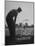 Golfer Byron Nelson Pitching His Shot onto the Green on 16th Hole, Going Three Feet Past the Hole-null-Mounted Photographic Print