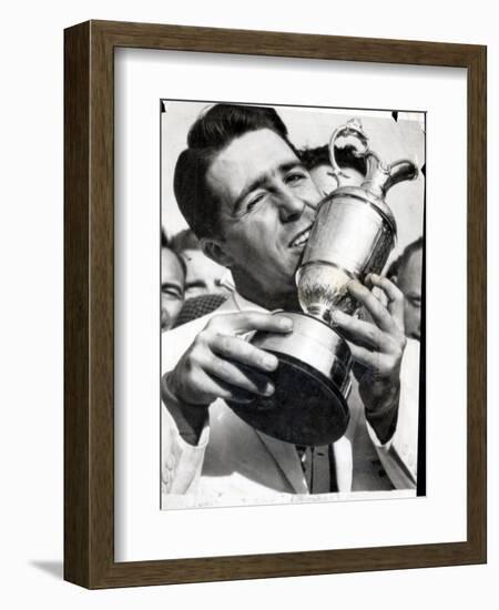 Golfer Gary Player Celebrates Winning the Open Golf Championship by Kissing Trophy-null-Framed Photographic Print