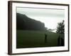 Golfer in Action with Water View Beyond-null-Framed Photographic Print