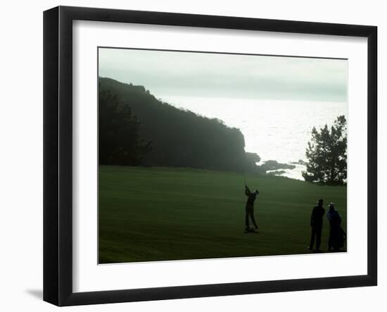 Golfer in Action with Water View Beyond-null-Framed Photographic Print