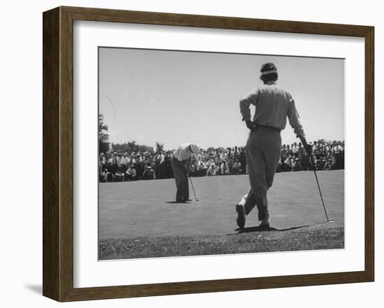 Golfer Putting the 12th Green-null-Framed Photographic Print